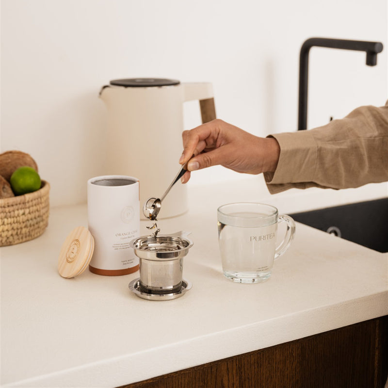 sinaasappel chai losse zwarte thee bewaarkoker sfeer