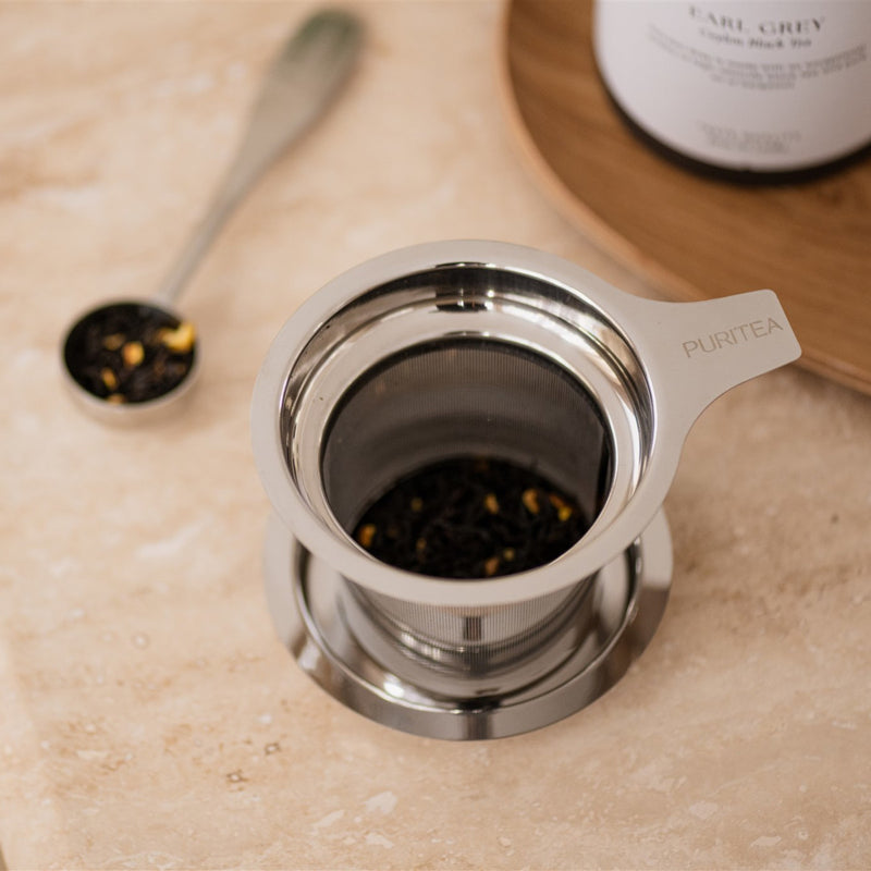 middag losse zwarte thee bewaarkoker sfeer